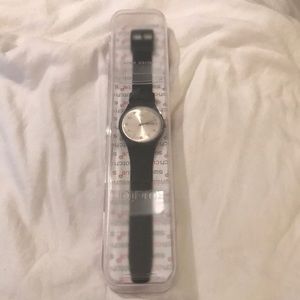 Brand new never opened Swatch watch.
